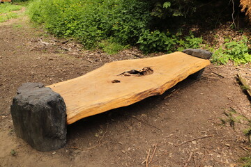 a nice brown garden bench