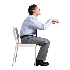 businessman sits on a chair
