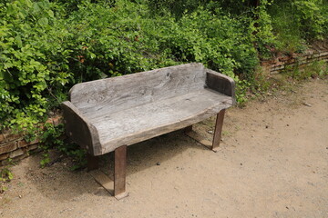 a nice brown garden bench