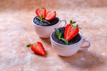 Delicious chocolate souffle with strawberries.