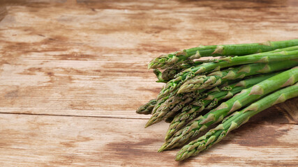 Bunch of a green asparagus on table