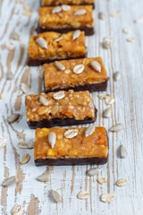 Fototapeta na wymiar Mini granola bars with almond and sunflower seeds.