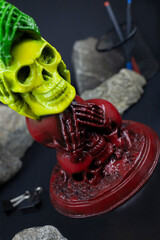 The statue of skulls no evil hear or see in rastaman colors