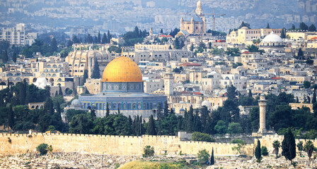 Panoramic View of Jerusalem Old City.  Holy Site of Dome of the Rock on Temple Mount, Ayyubid Mosque of Oma, old cemetery are in view. Telephoto compression and depth of View.