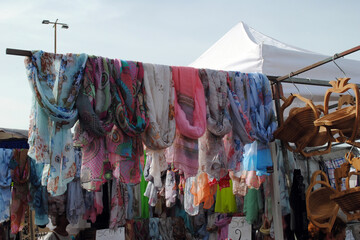 Market Stall Display of Colourful Fabric Scarves
