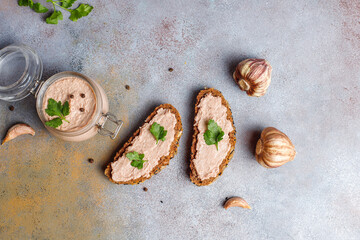Fresh homemade chicken (duck,goose,rabbit,turkey) liver pate on whole grain bread with seeds. - obrazy, fototapety, plakaty