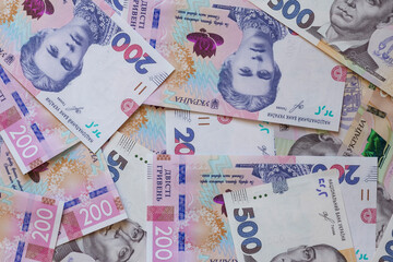 close up of one hundred and five hundred hrivna banknotes
