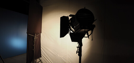 Studio light equipments for photo or film movie video. Light set for professional shooting and screen background. LED Flood light and Spot light for video production. Setup include Barn door softbox.