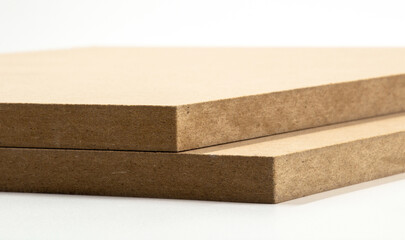 Two wooden panels photographed from the front, better known as raw MDF.