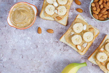 Sandwich with peanut butter and banana slices.