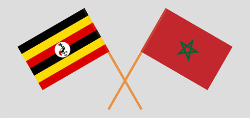 Crossed flags of Uganda and Morocco. Official colors. Correct proportion