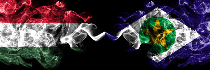 Hungary, Hungarian vs Brazil, Brazilian, Mato Grosso smoky flags side by side.