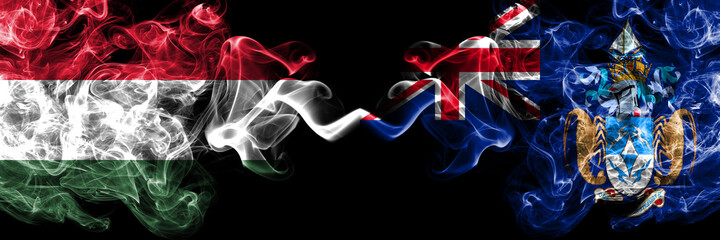 Hungary, Hungarian vs British, Britain, Tristan da Cunha smoky flags side by side.
