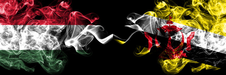 Hungary, Hungarian vs Brunei, Bruneian smoky flags side by side.
