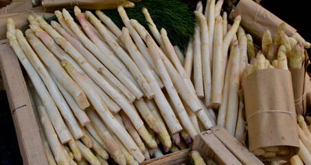 Full frame background of raw white asparagus displayed for sale