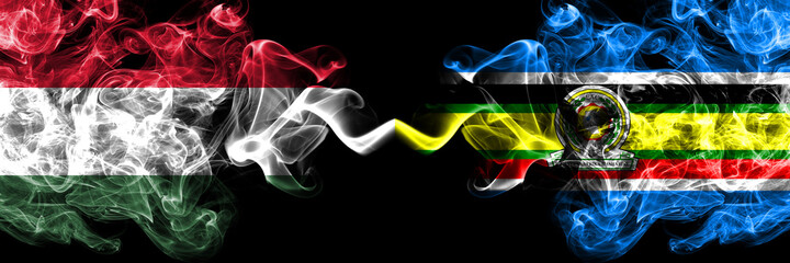 Hungary, Hungarian vs East African Community smoky flags side by side.