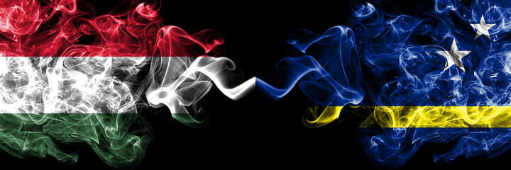 Hungary, Hungarian vs Netherlands, Dutch, Holland, Curacao smoky flags side by side.