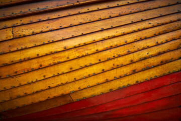 The wooden hull of a small boat for use as a background or texture