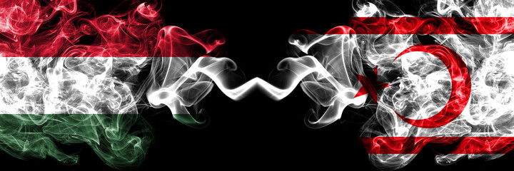 Hungary, Hungarian vs Northern Cyprus smoky flags side by side.