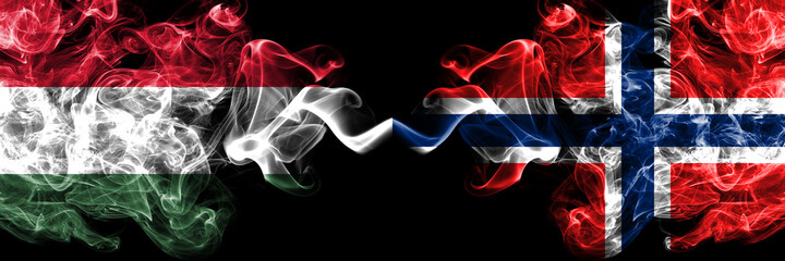 Hungary, Hungarian vs Norway, Norwegian smoky flags side by side.