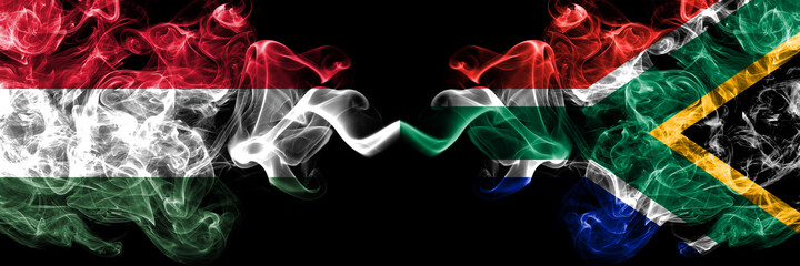 Hungary, Hungarian vs South Africa, African smoky flags side by side.