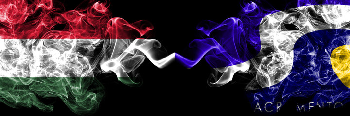 Hungary, Hungarian vs United States of America, America, US, USA, American, Sacramento, California smoky flags side by side.