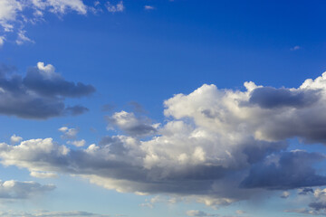 Fototapeta na wymiar Blue sky and fluffy, white clouds.