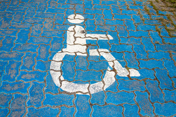 Painted wheelchair parking sign