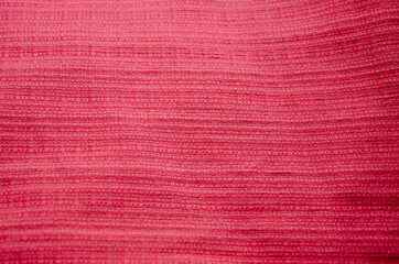 Melon pink summer abstract textured fabric background