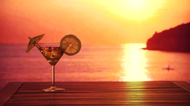 Video footage glass cocktail with lemon on the background of the sea, sun and boats.