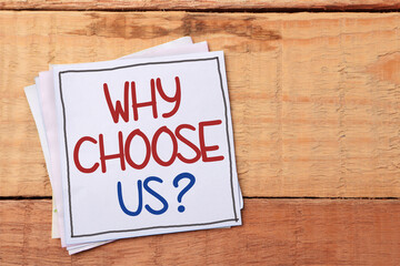 Why choose us, text words typography written on paper, business motivational inspirational