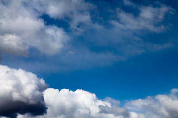 blue sky. cumulus clouds on a beautiful sky. background with blank space for text