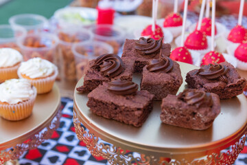 Candy table at a party with sweet desserts