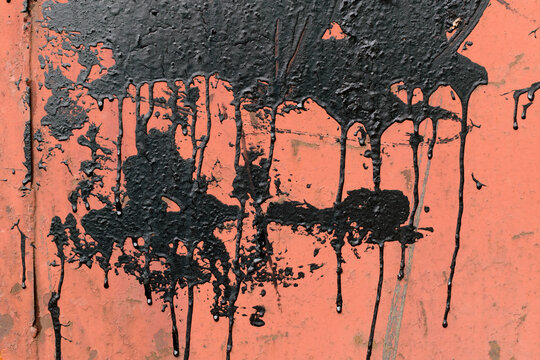 Blots of tar with smudges on the surface. Color - Copper Hue Red, black.