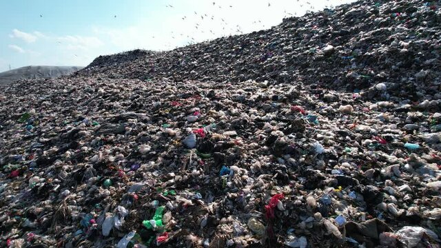 Mountain large garbage pile and pollution, Pile of stink and toxic residue
