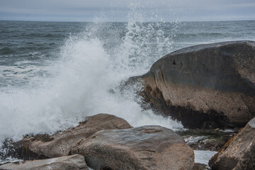 waves crashing on rocks