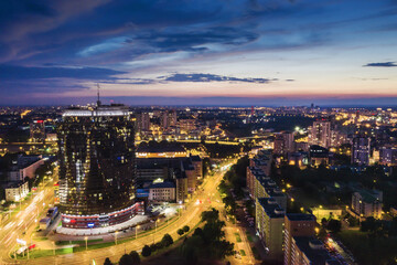 Fototapeta na wymiar panoramic view of Minsk city on sunset. aerial cityscape view with illuminated buildings and streets.