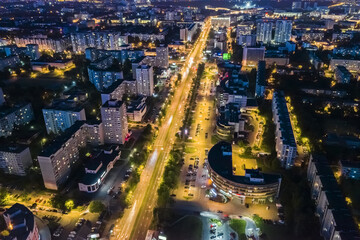 Fototapeta na wymiar night view from the top of illuminated streets and buildings of Minsk city, Belarus