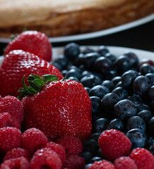 Plate of fresh juicy berries, healthy summer snack