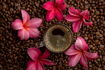 Cup coffee on roasted coffee bean and red plumeria.