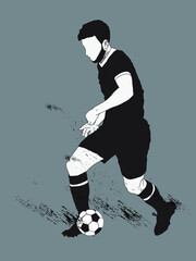 vector silhouette of a football player kicking a football