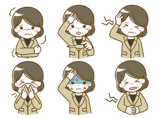 体調の悪いスーツを着た中年女性