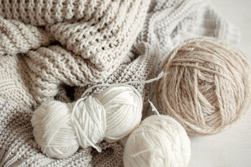Close-up of pastel yarns and knits.