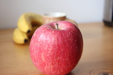 picture of apple with banana and espresso cup