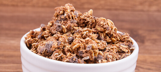 Oat flakes with chocolate as source iron and fiber, healthy snack concept