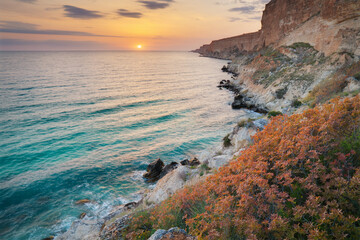 Sunset on sea cliffs.