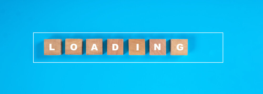 Square wood with LOADING letters in progress bar on a blue background.