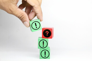 red wood cubes are rejected and replaced with green wood cubes. the concept of questions and answers