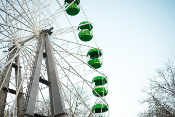 Ferris wheel against the blue sky