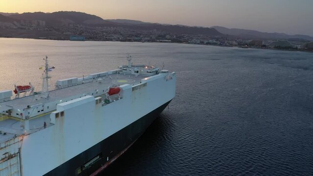 Aerial view over Vehicles Carrier Ship at Sunset in Red sea
drone view from Eilat,Israel, may 30,2021
